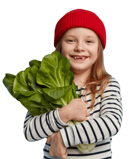 little girl with lettuce